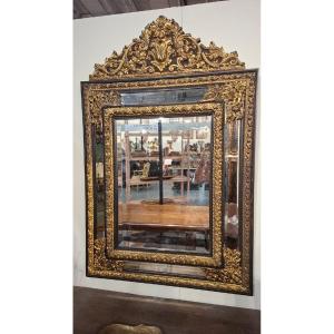 Miroir en bois ébène et métal balayé