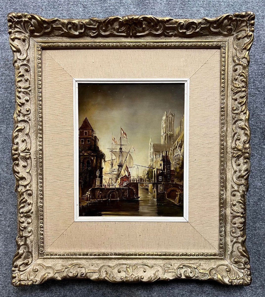19th Century Flemish School: Lively Port Scene With A Cathedral In The Background