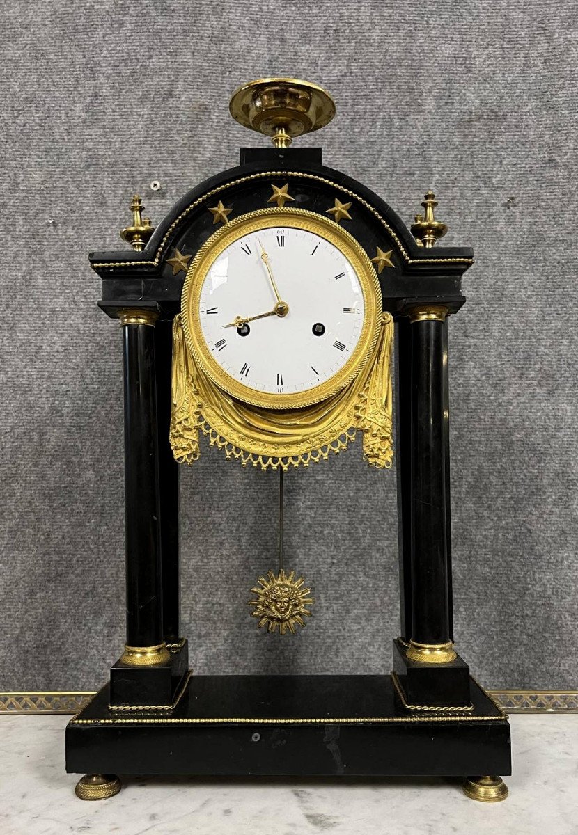 Empire Period Portico Clock In Black Marble And Gilded Bronzes 