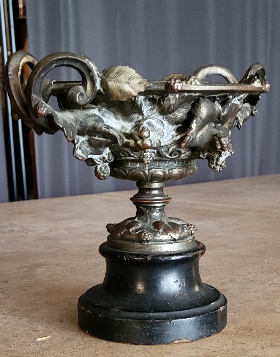 A Patinated Bronze Cup, Richly Decorated With Foliage, Bunches Of Grapes And Scrolls. -photo-1