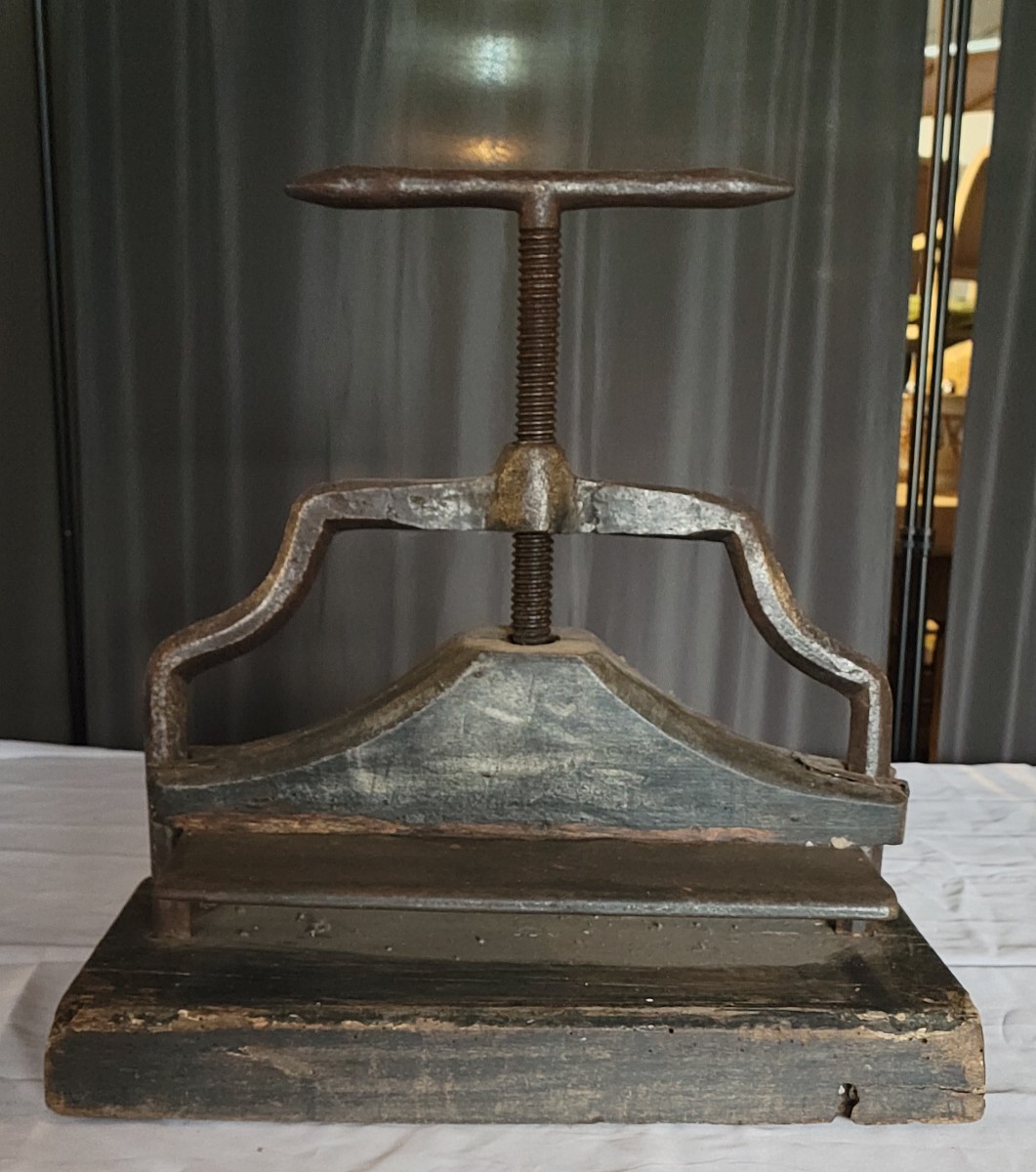 A 19th-century Napoleon III Period Bookbinding Press, Made Of Patinated Cast Iron Mounted On Its Wooden Base. 