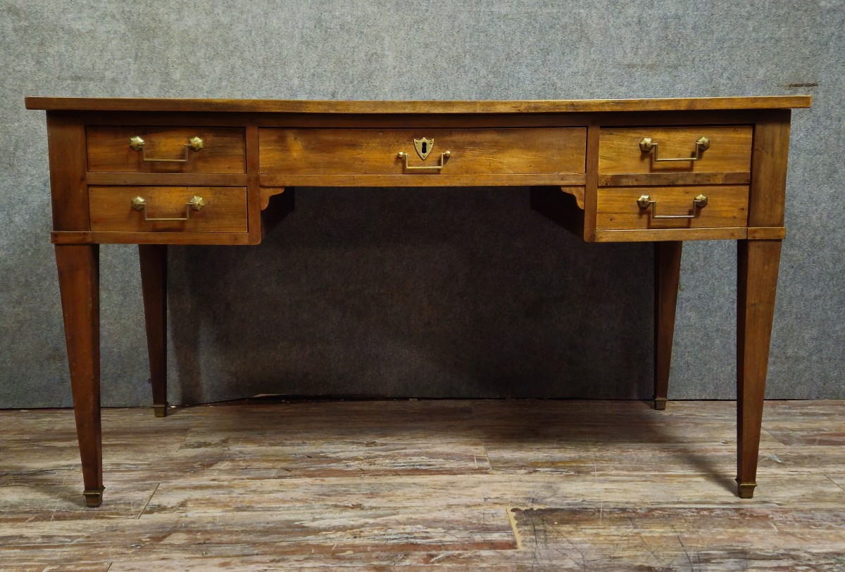 Bureau plat époque directoire en noyer, travail XIXᵉ siècle