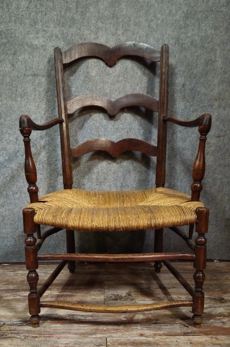 Antique Armchair In Solid Wood With A Woven Straw Seat, In A Rustic/provincial Style.