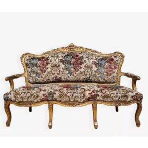 Banquette Baroque de style Louis XV en bois doré et sculpté