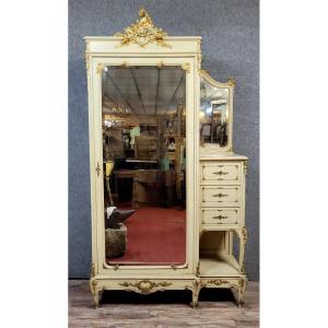 Armoire Venitienne style Louis XV baroque estampillée en bois laqué et doré 
