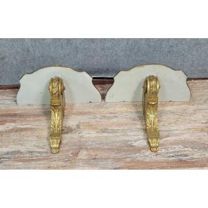  Paire de consoles d'appliques style Louis XV en bois doré  