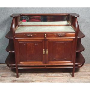 D'après Louis Majorelle : Rare et grand meuble époque Art Nouveau en acajou et cuir gauffré
