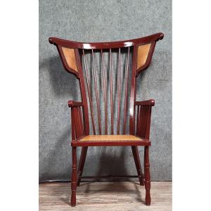  fauteuil Vintag au design inspiré des chaises Windsor, doté d’un haut dossier à barreaux 