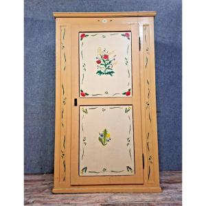 A Traditional Folk-style Cabinet, Made Of Wood And Entirely Painted.