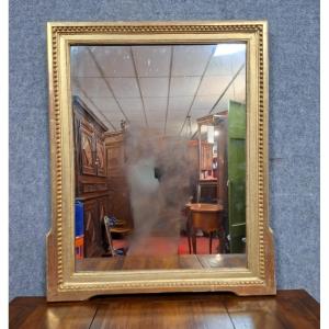 Antique Mirror With A Beaded Frieze In Gilded Wood – 19th Century