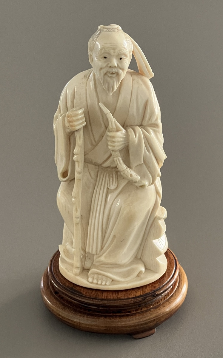 Carved Ivory Okimono Representing An Old Man 