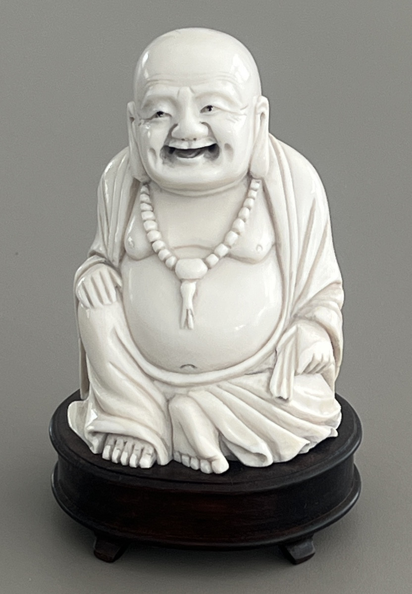 Ivory Carved Okimono Representing A Laughing Buddha 