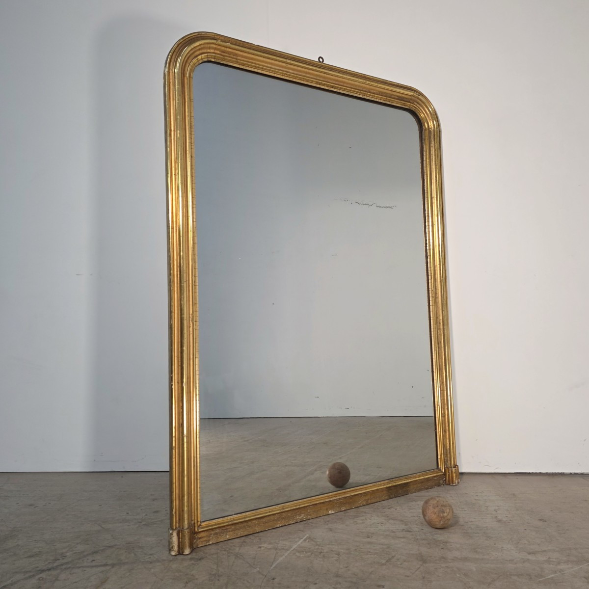 Miroir milieu 19ème doré à la feuille