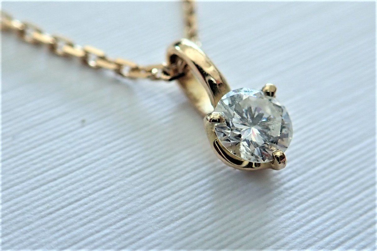 Diamond Pendant With Its 18 Carat Gold Chain