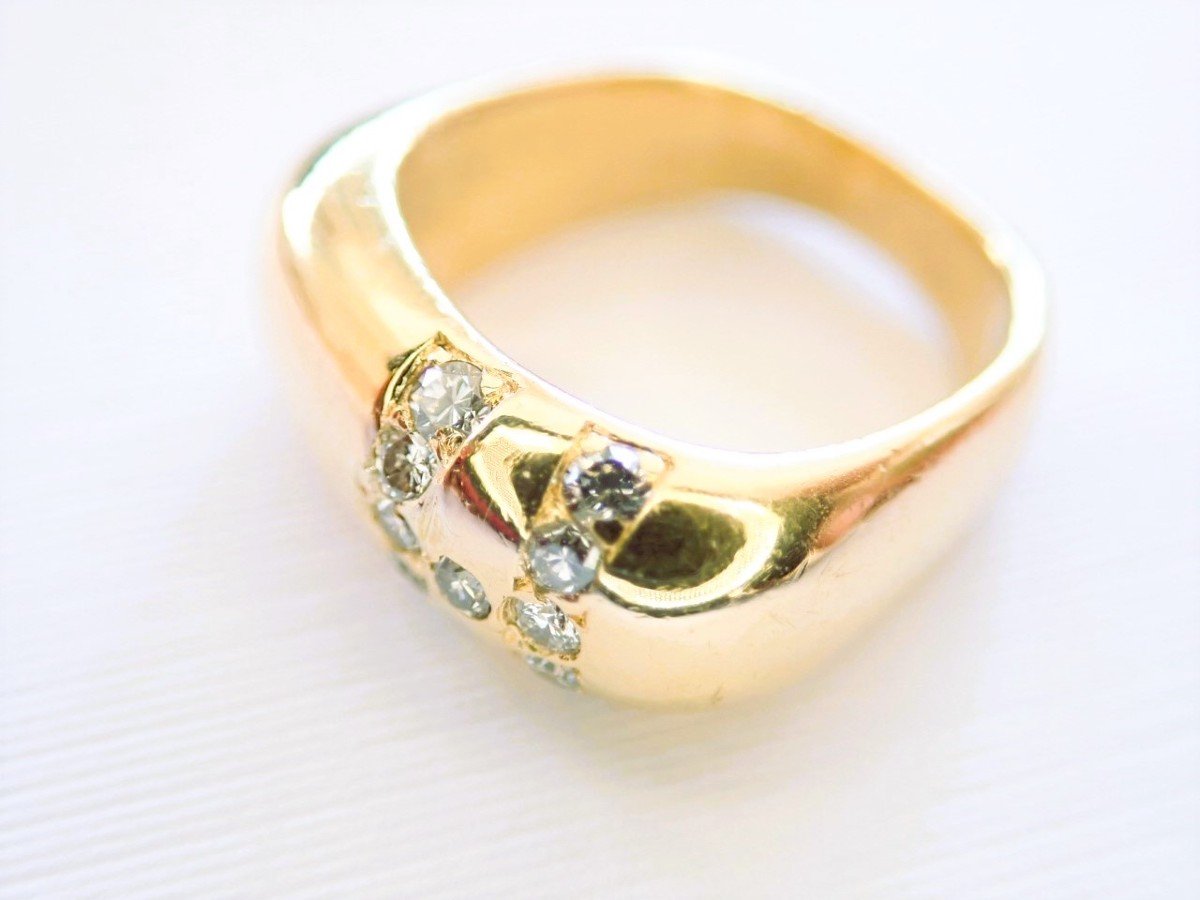 Jonc or massif 18 carats serti de diamants