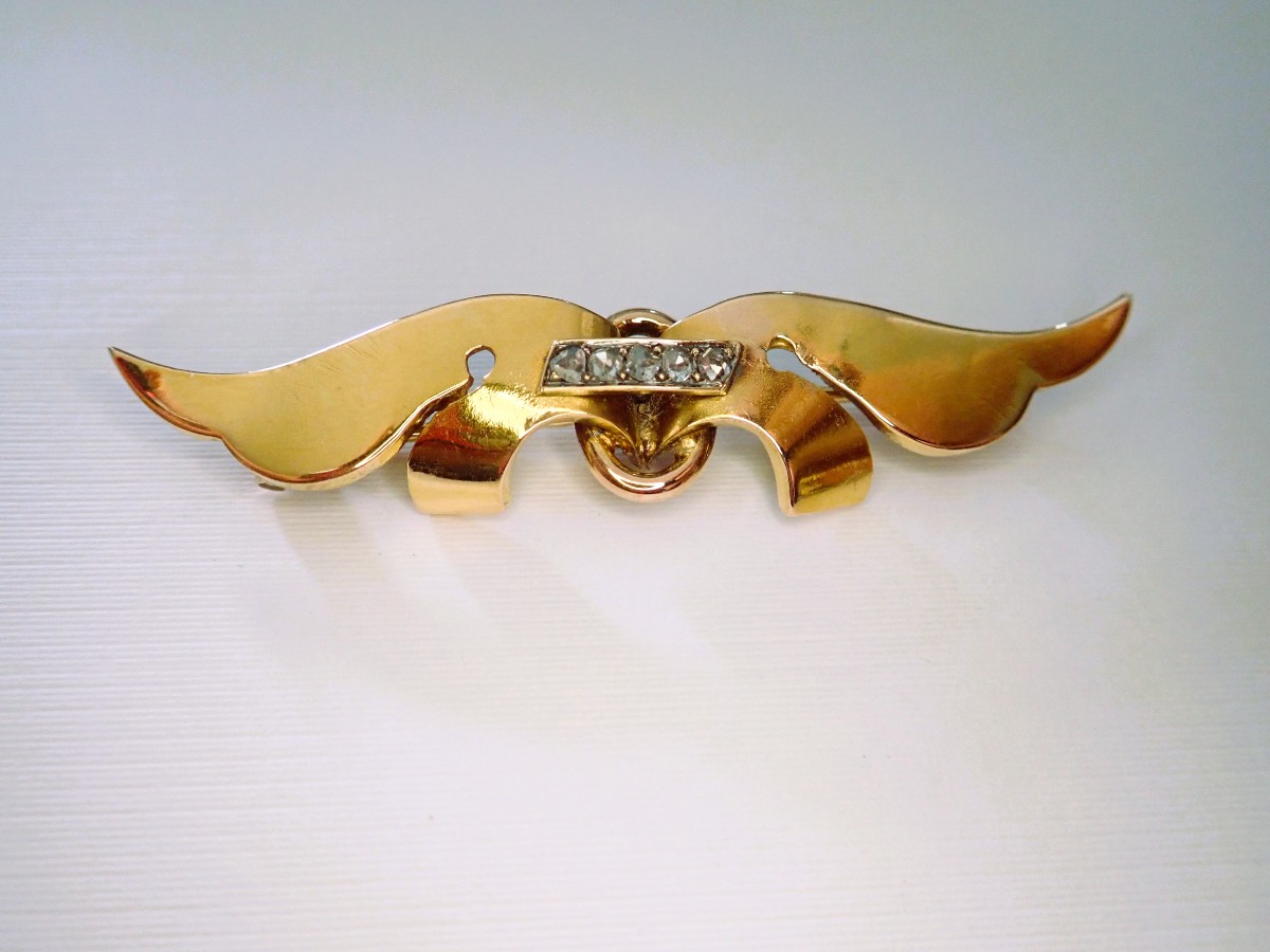 Broche art déco diamants  en or 18 carats