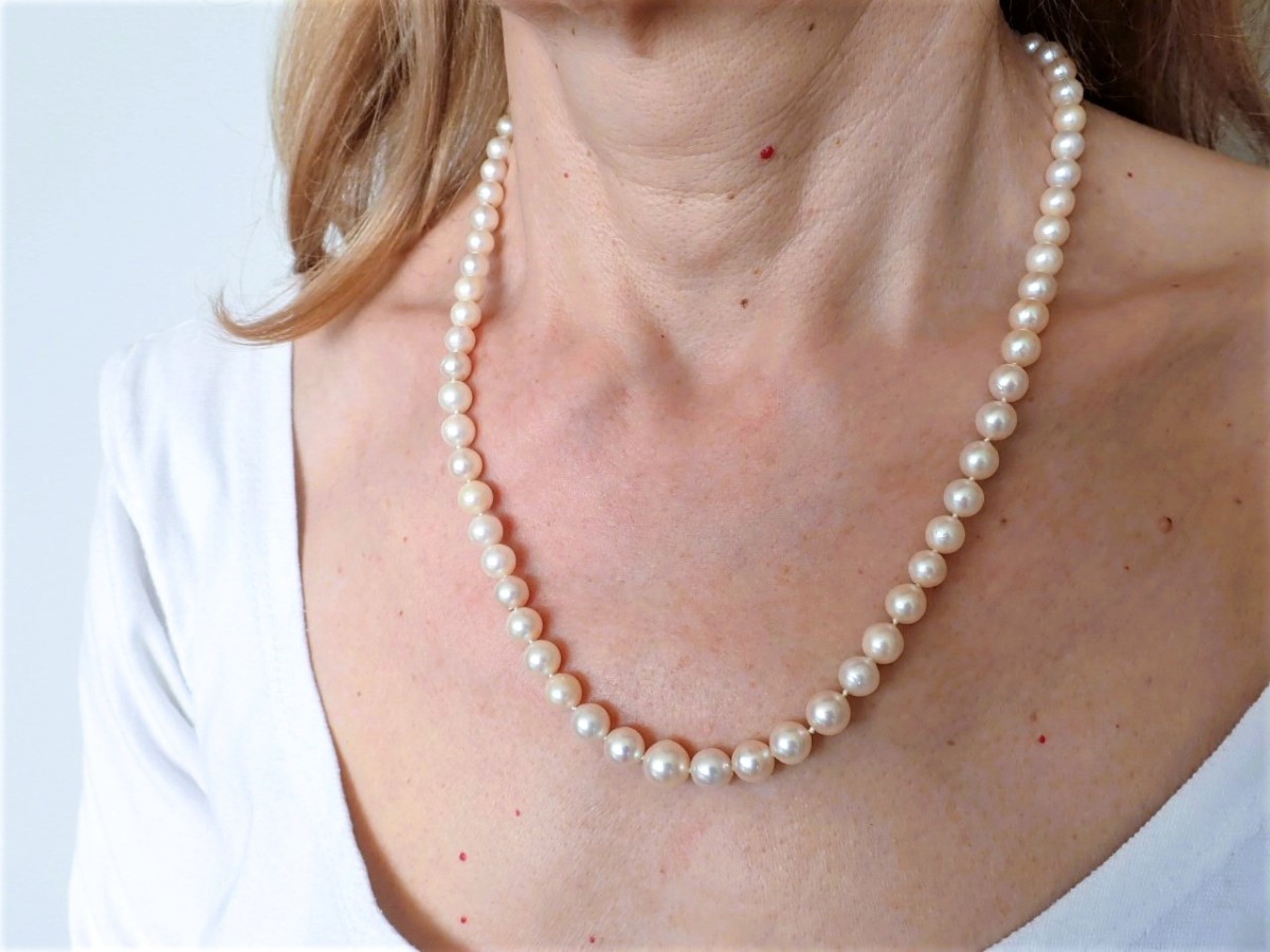 Sautoir de perles fermoir or blanc 18cts rubis et diamants