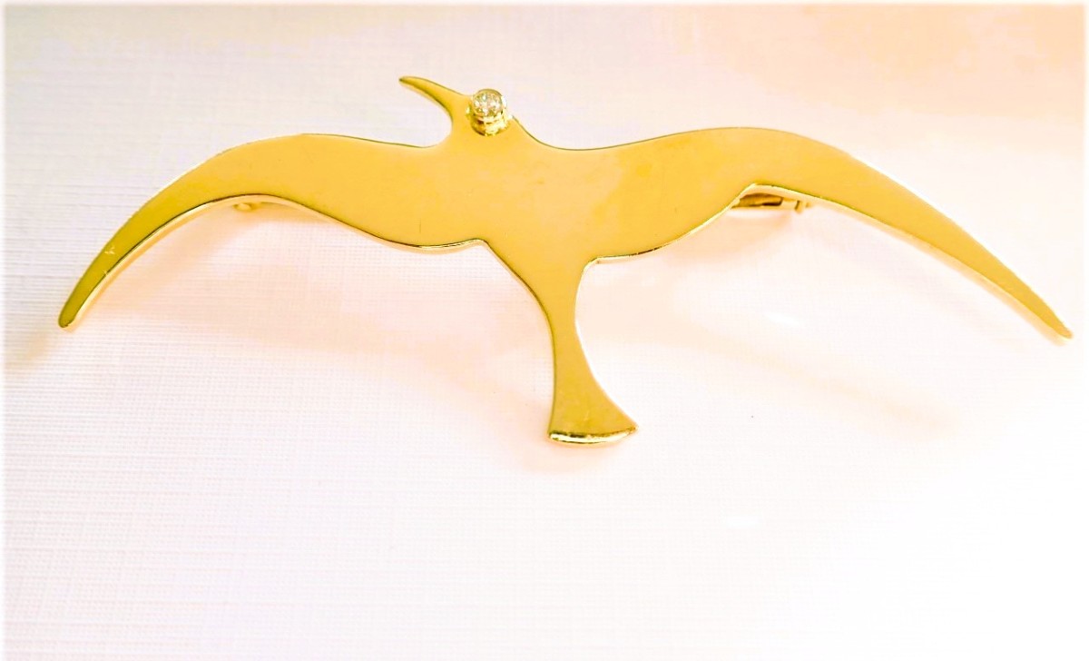 Broche motif oiseau albatros   or 18 carats