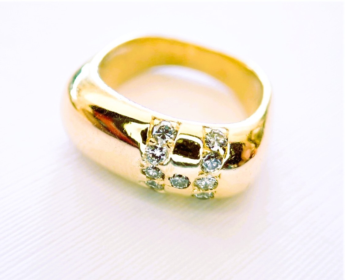 Bague jonc massive or 18 carats sertie de diamants