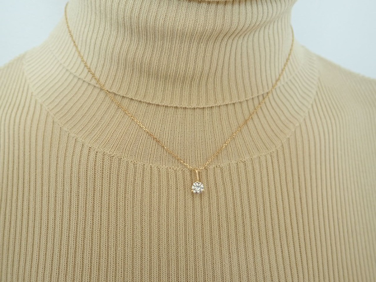 Diamond Pendant And Its 18-carat Gold Chain