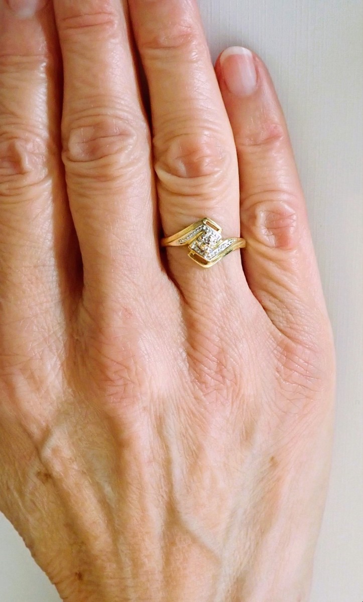 Bague bicolore 2 ors 18 carats petit diamant au centre-photo-2
