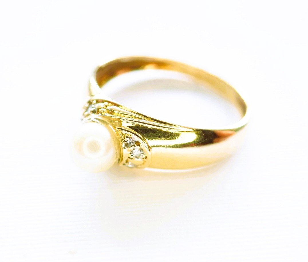 Bague jonc perle et diamants or 18 carats