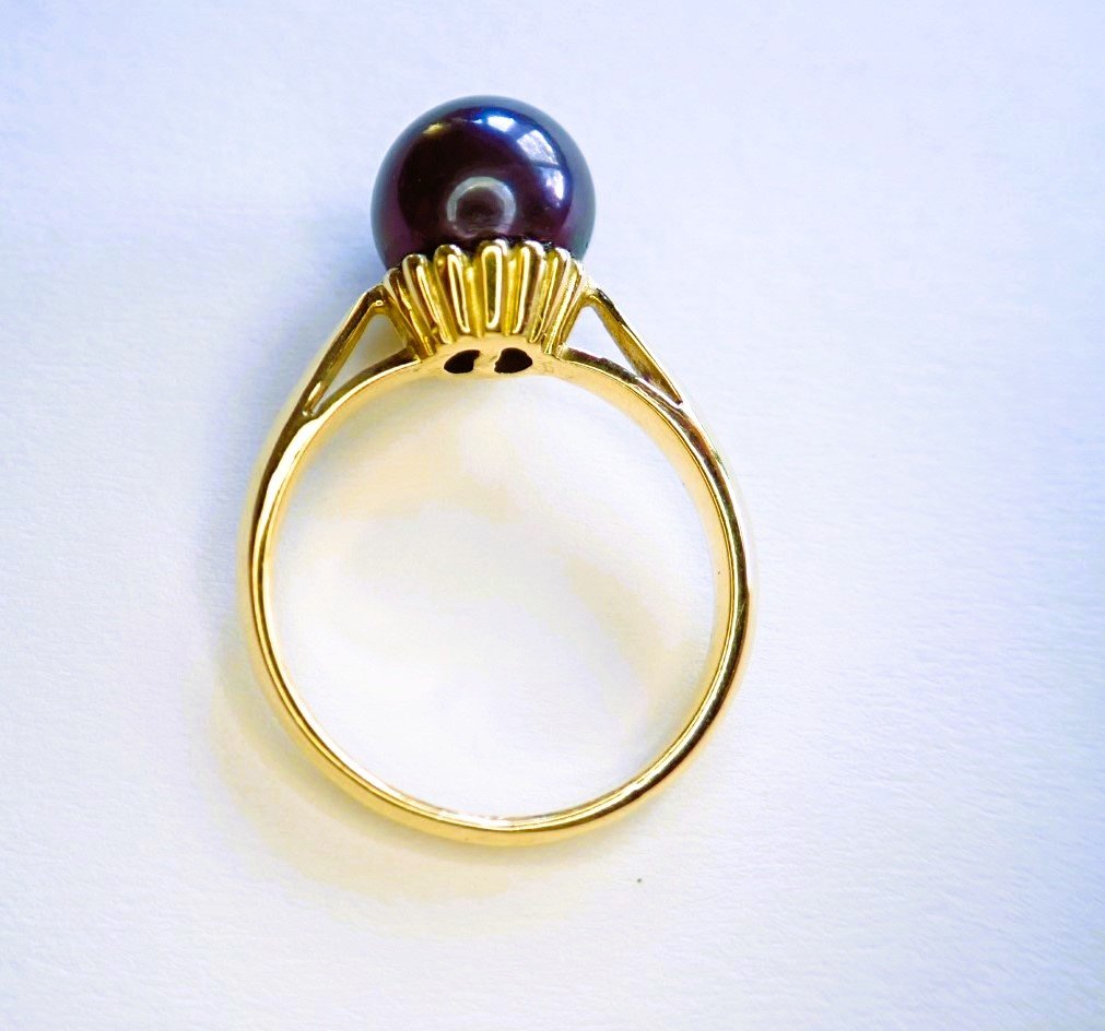 Bague or 18 carats sertie d'une perle noire