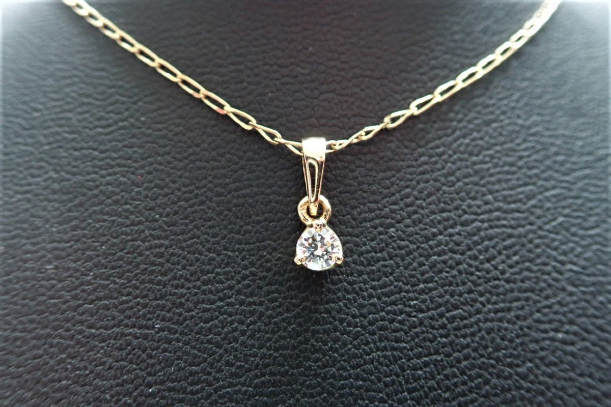 Diamond Pendant With Its 18 Carat Gold Chain