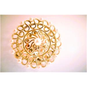 Broche vintage sertie de perles or 18 carats