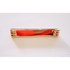 Broche de bavoir bébé or 18 carats