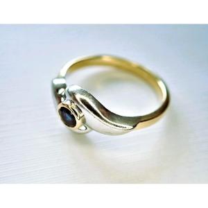 Bague or blanc et or jaune 18 carats sertie d'un saphir