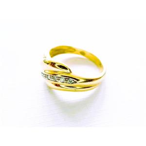 18-karat Gold Gadrooned Ring Set With Diamonds