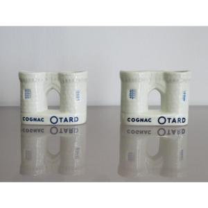 Paire de porte cure-dents publicitaires.