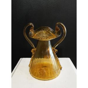 Vase en verre soufflé ambré Gordiola.