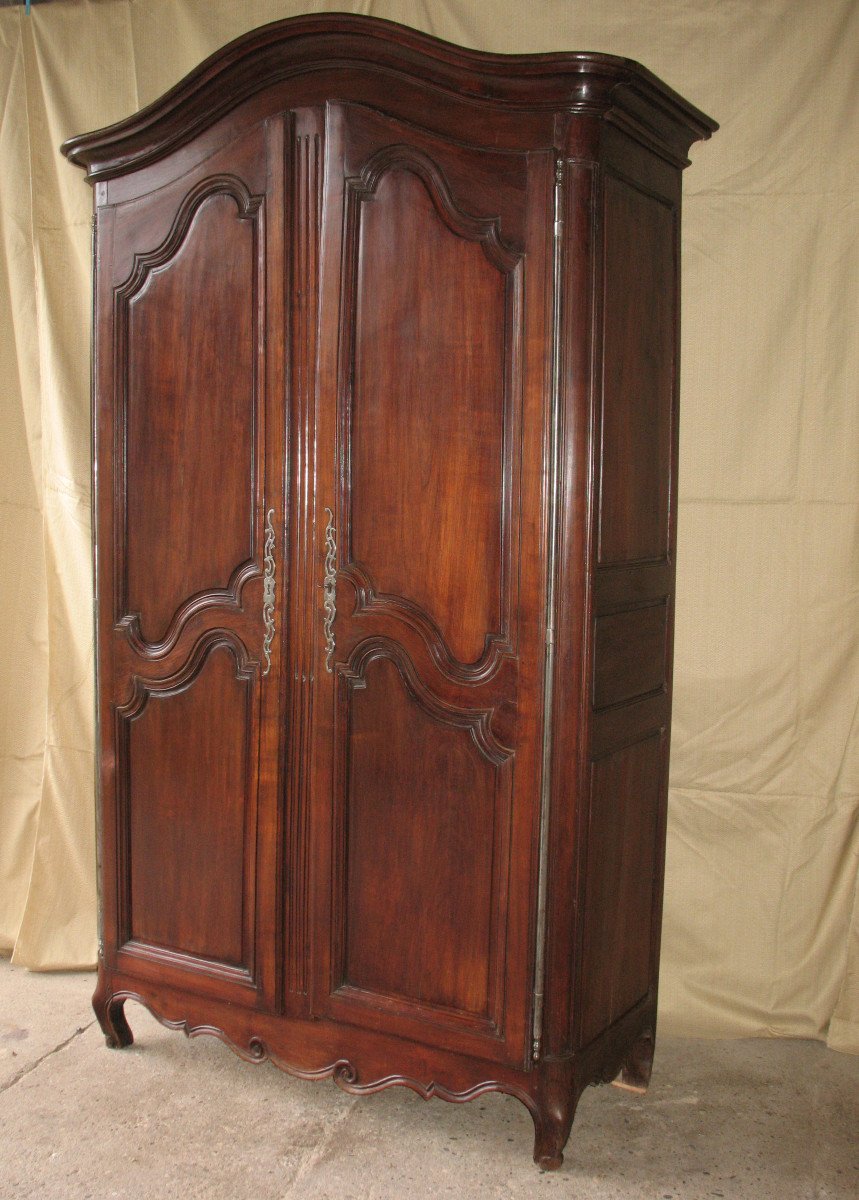 Armoire en bois fruitier début 19ème de style Louis XV