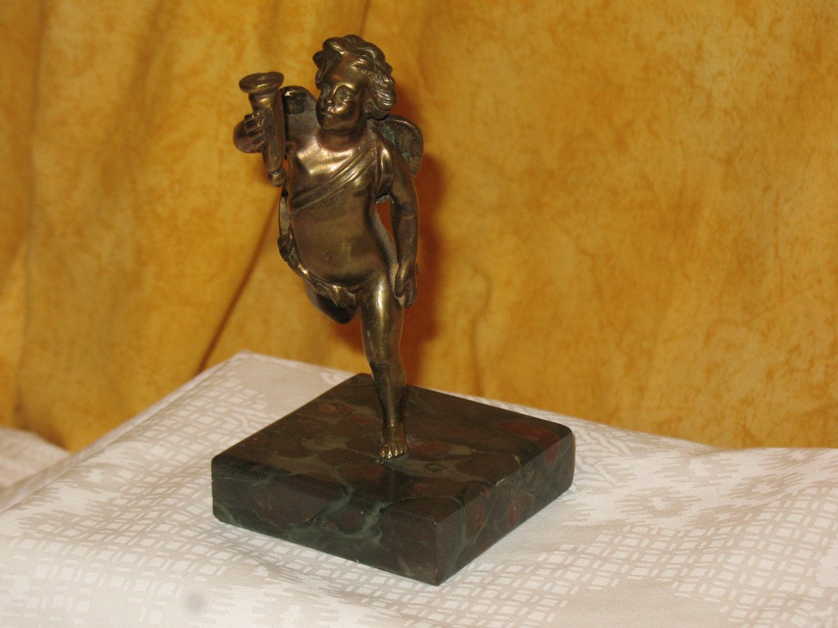 Bronze Sculpture Of A Cherub Carrying A Torch-photo-3