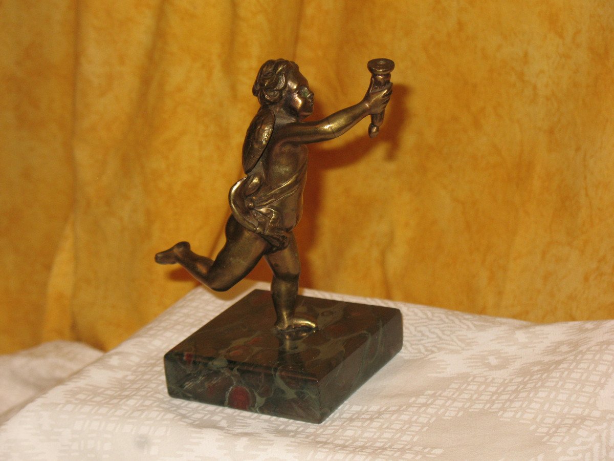 Bronze Sculpture Of A Cherub Carrying A Torch-photo-2