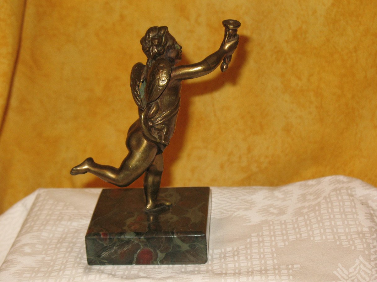 Bronze Sculpture Of A Cherub Carrying A Torch-photo-3