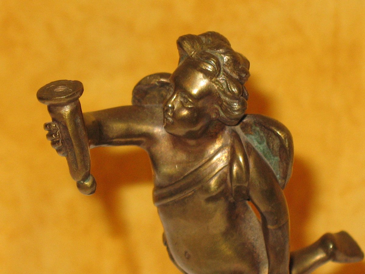 Bronze Sculpture Of A Cherub Carrying A Torch-photo-4