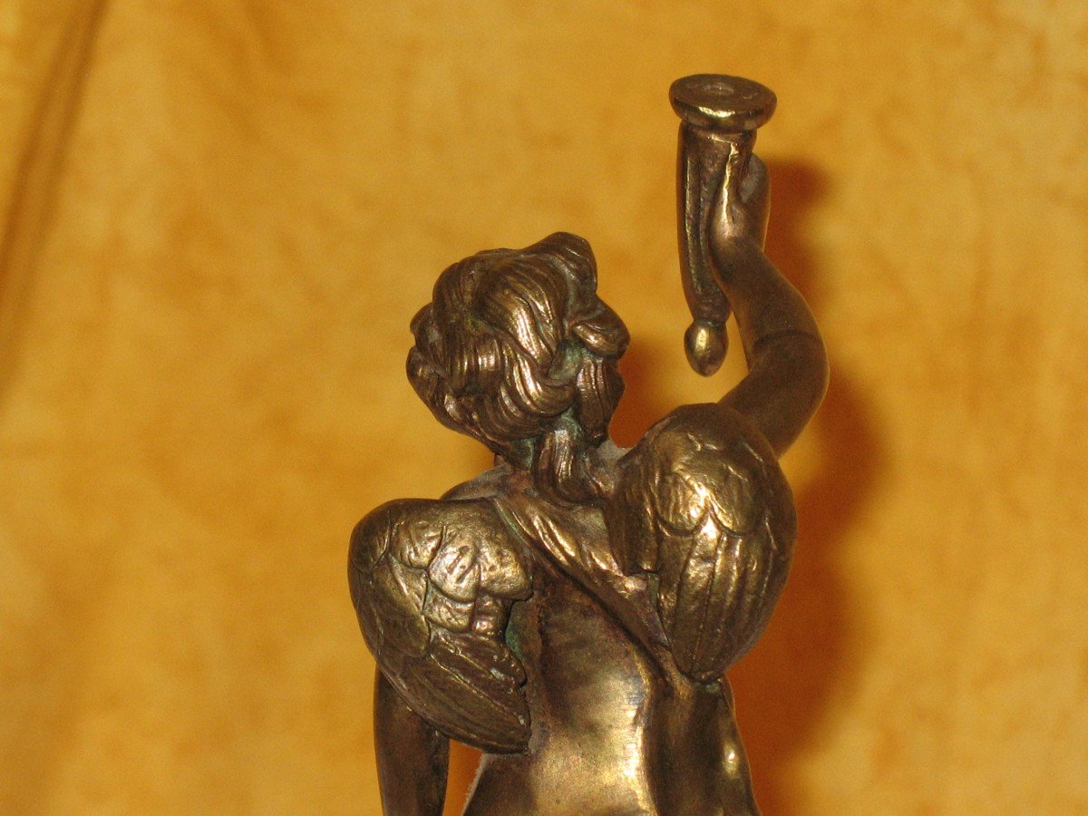 Bronze Sculpture Of A Cherub Carrying A Torch-photo-6