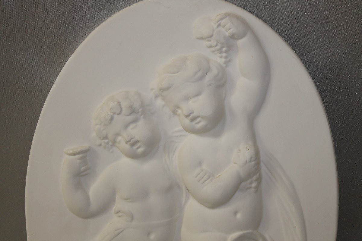 Paire de bas reliefs en plâtre à décor d'angelots de style Louis XVI époque 20ème-photo-4