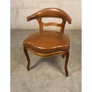 Fauteuil de bureau en noyer de style Louis XV époque 19ème recouvert d'un cuir havane