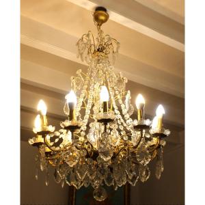 Lustre en bronze avec pampilles à 12 bras de lumière époque début 20ème