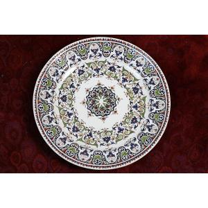 Grand plat en faïence à décor floral rayonnant dans le goût de Rouen