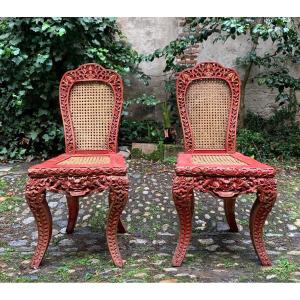 Pair Of Red Lacquered Caned Chairs