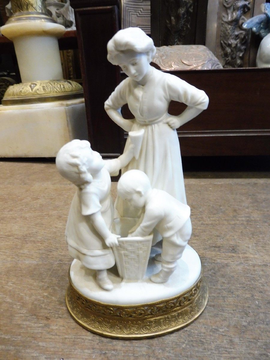 Biscuit Porcelain Group, Circa 1900, On A Gilt Brass Base 