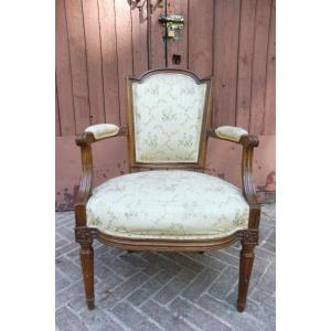 Fauteuil cabriolet d'époque Louis XVI en bois ciré