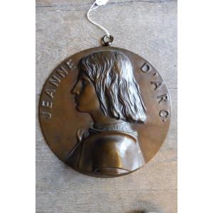 Profil en bronze  signé  Chapu  "jeanne d' Arc  "  