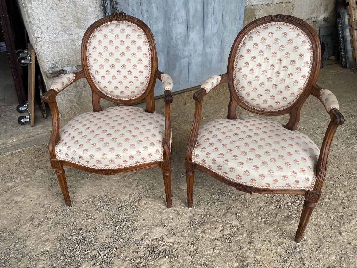 Pair Of Louis XVI Armchairs In Walnut 