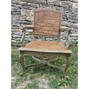 Fauteuil style Régence patiné 
